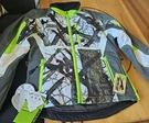 Arctic Cat Woman's Insulated Snowmobile Jacket Size X Small - Green Camo. Fixed Price $175.00.