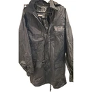 Indian Motorcycle Unisex Rain Jacket Size Black Original Pkg. Gilroy Ca. Fixed Price $69.99.